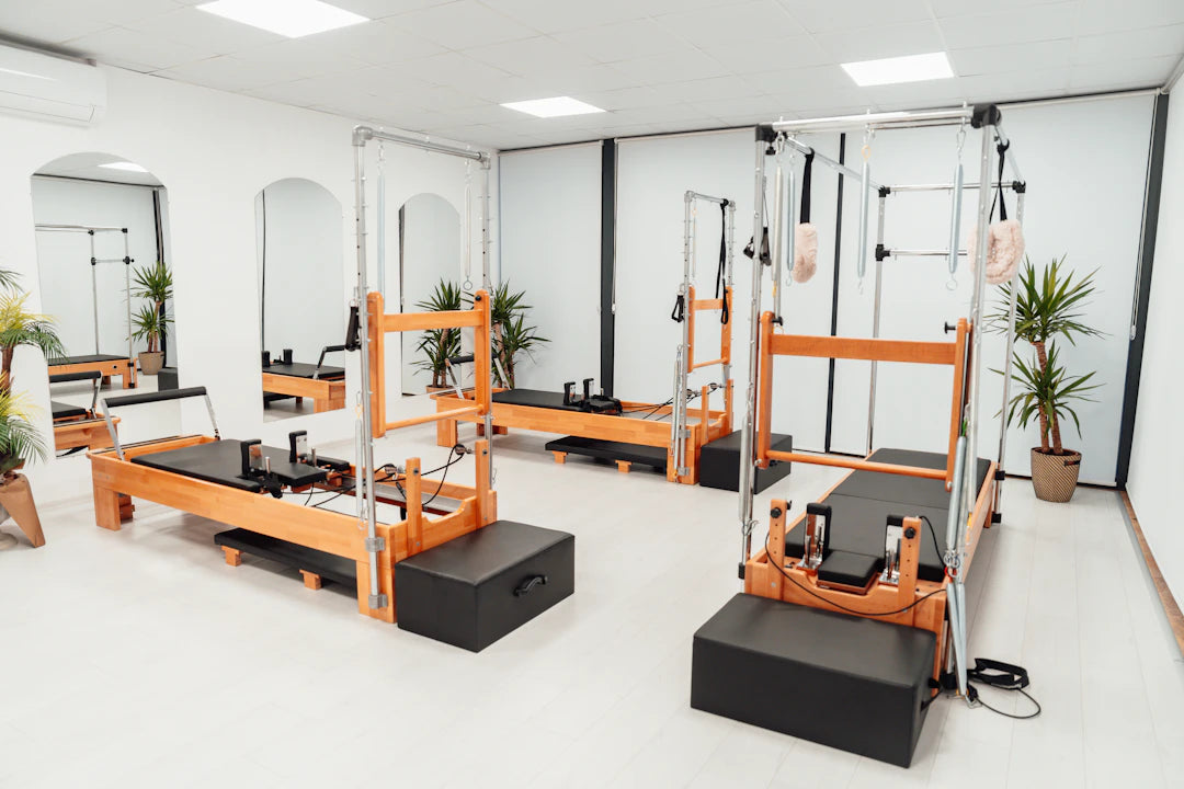 Space-Saving Pilates Wall Units for Efficient Studio Setup