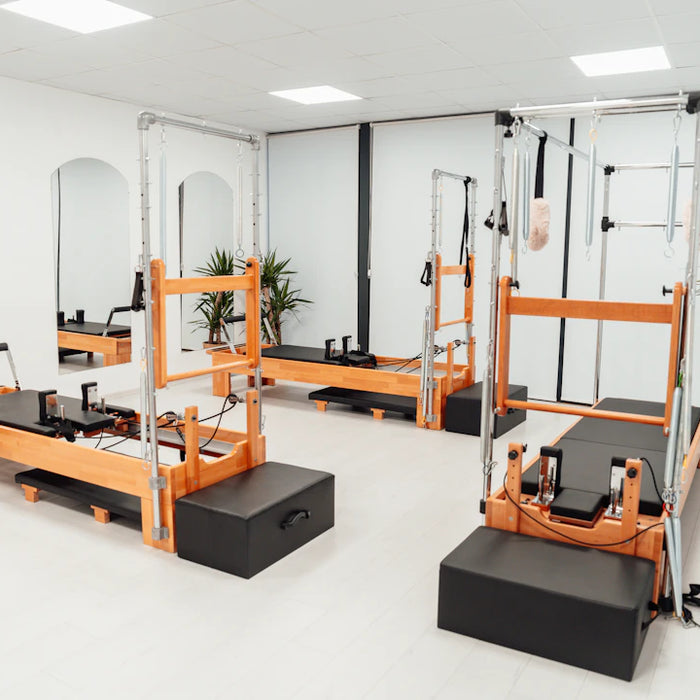 Space-Saving Pilates Wall Units for Efficient Studio Setup