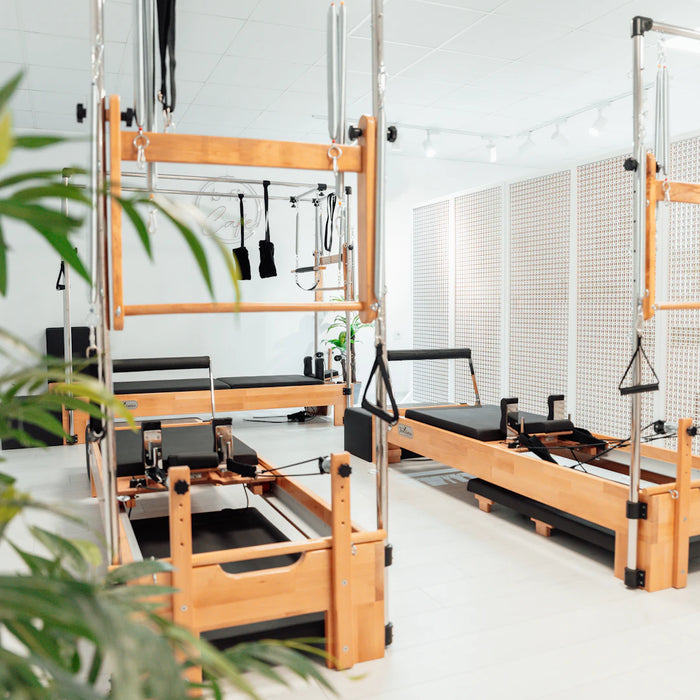 Understanding the Difference Pilates Reformer vs. Traditional Pilates
